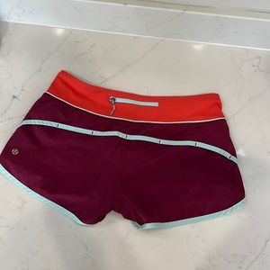 Lululemon Speed Short Maroon/ Aqua/ Orange. Size 6.
